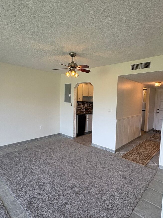 Building Photo - (55+) 2/2 Condo in the Peaceful Miles Grant Golf Course Community