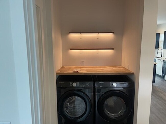 Building Photo - Brand new 2 bed/2 bath, central a/c, dishwasher, washer & dryer, deck & patio!