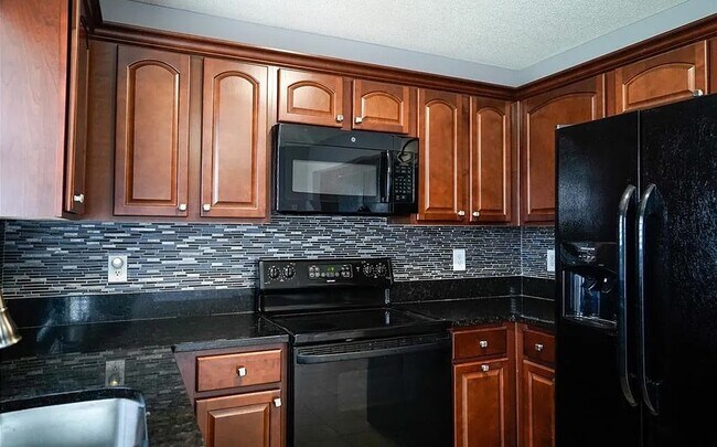 Building Photo - 853 E 167th Ct