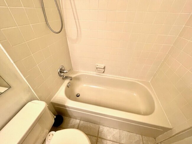 Building Photo - 2-Bedroom in Woodside Condos