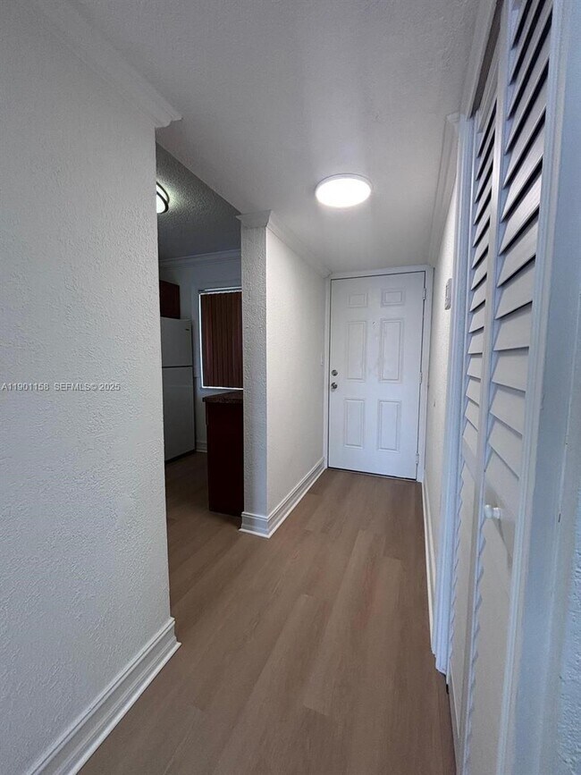 Building Photo - 8740 N Sherman Cir