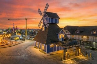 Exterior, Dusk - The Mill on 76 Apartments