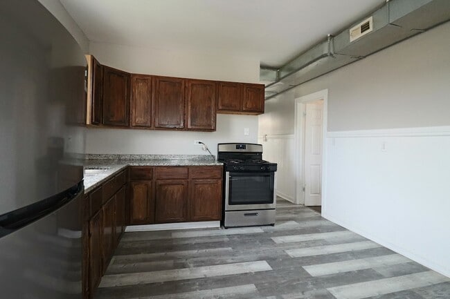 Building Photo - 6633 S Campbell Ave