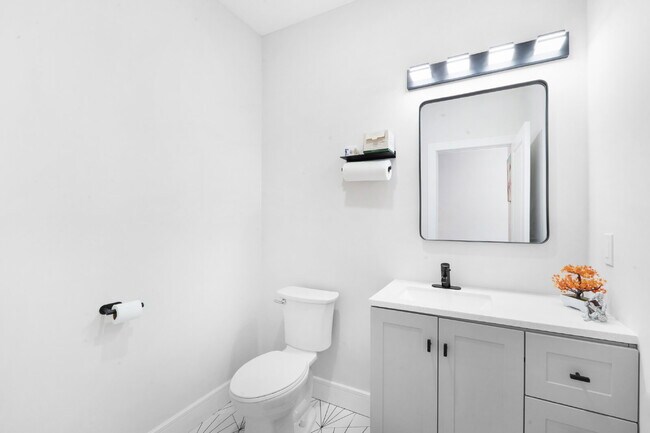 Building Photo - Movie in special, first 1/2 month rent is FREE! Charming 2-Bedroom Condo with 2 Full & 2 Half Bat...