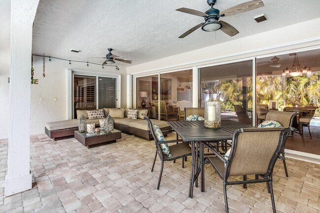 Huge covered patio overlooking the pool, great for entertaining - 2535 NW 41st St