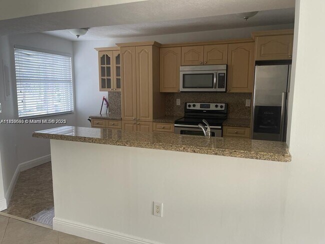 Building Photo - 4871 NW 97th Ct