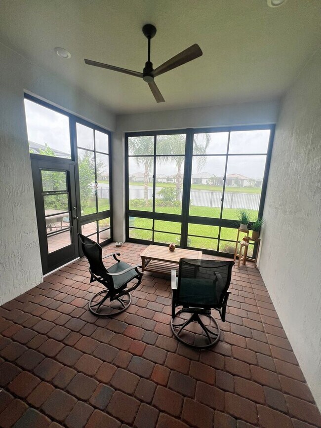 Building Photo - STUNNING LAKEFRONT 3 BEDROOM, 2.5 BATH HOM...