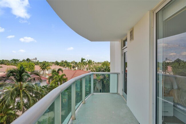 Building Photo - 19370 Collins Ave