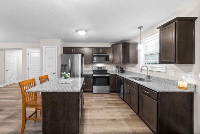 Building Photo - Stocked Pond, Walking Trails and More!!