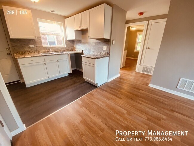 Building Photo - 8153 S Colfax Ave