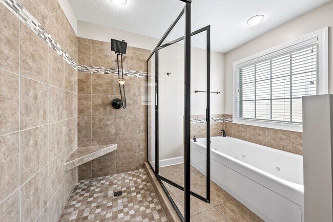 Building Photo - Pet Friendly Three Bedroom with Bonus!
