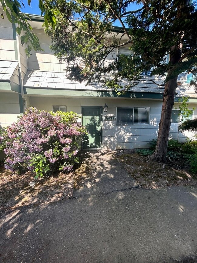 Building Photo - NW Vancouver Condo with Detached Garage & Dedicated Parking