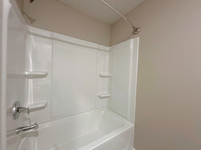 Building Photo - Spacious 4BR Home with Private Backyard Oasis
