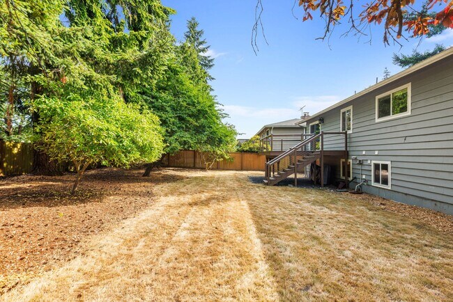 Building Photo - Updated Split-Level Home with Flexible Living Spaces & Backyard Deck