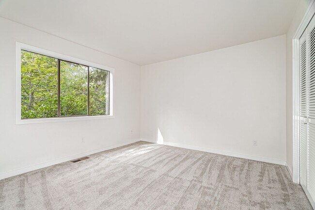 Building Photo - Top-Floor Condo with Forest Views, Large Private Deck & Resort-Style Amenities