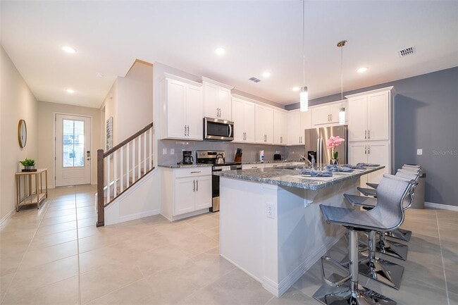 Building Photo - 1808 Tropical Palms Cir
