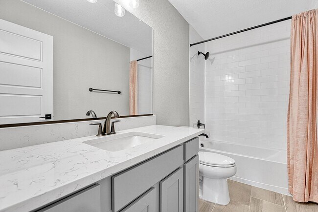 Building Photo - Former Model Home - Superb townhome in great location!