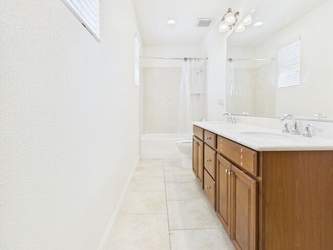 Building Photo - Spacious 5-Bedroom Solar Home in Blackstone with Resort Style Amenities
