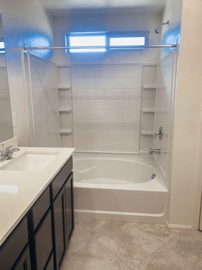 Building Photo - Beautiful Townhome in a Gated Community with 2-Car Garage!!