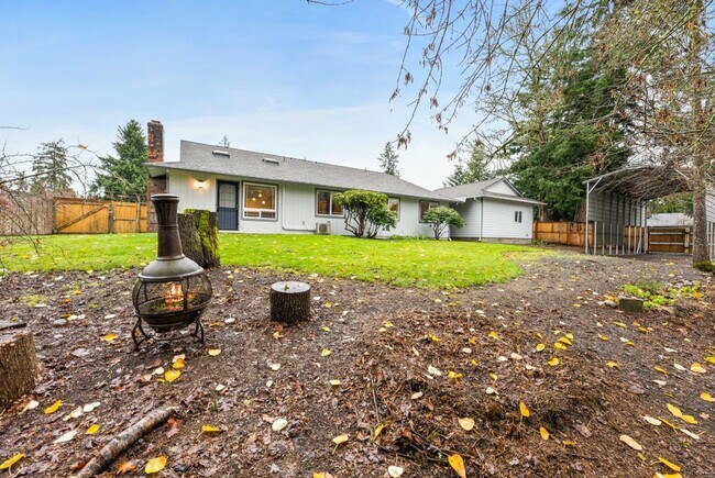 Building Photo - Charming Tacoma Home with A/C, RV Parking, Workshop & Skylit Living Room