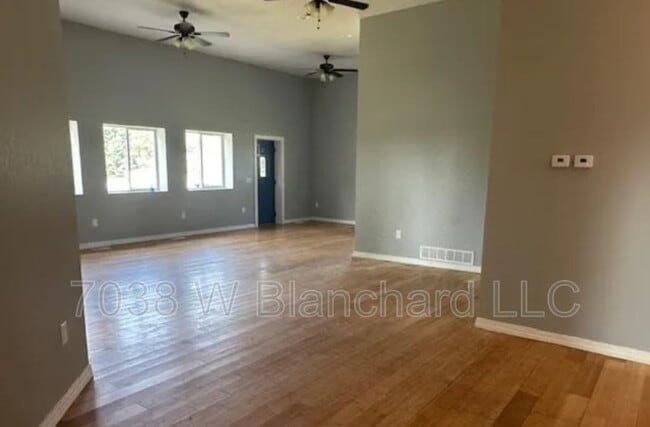 Building Photo - 7038 W Blanchard Rd