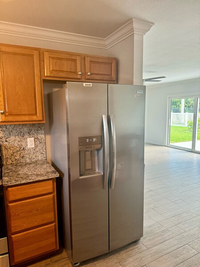 Building Photo - 1612 SE Cascella Ct