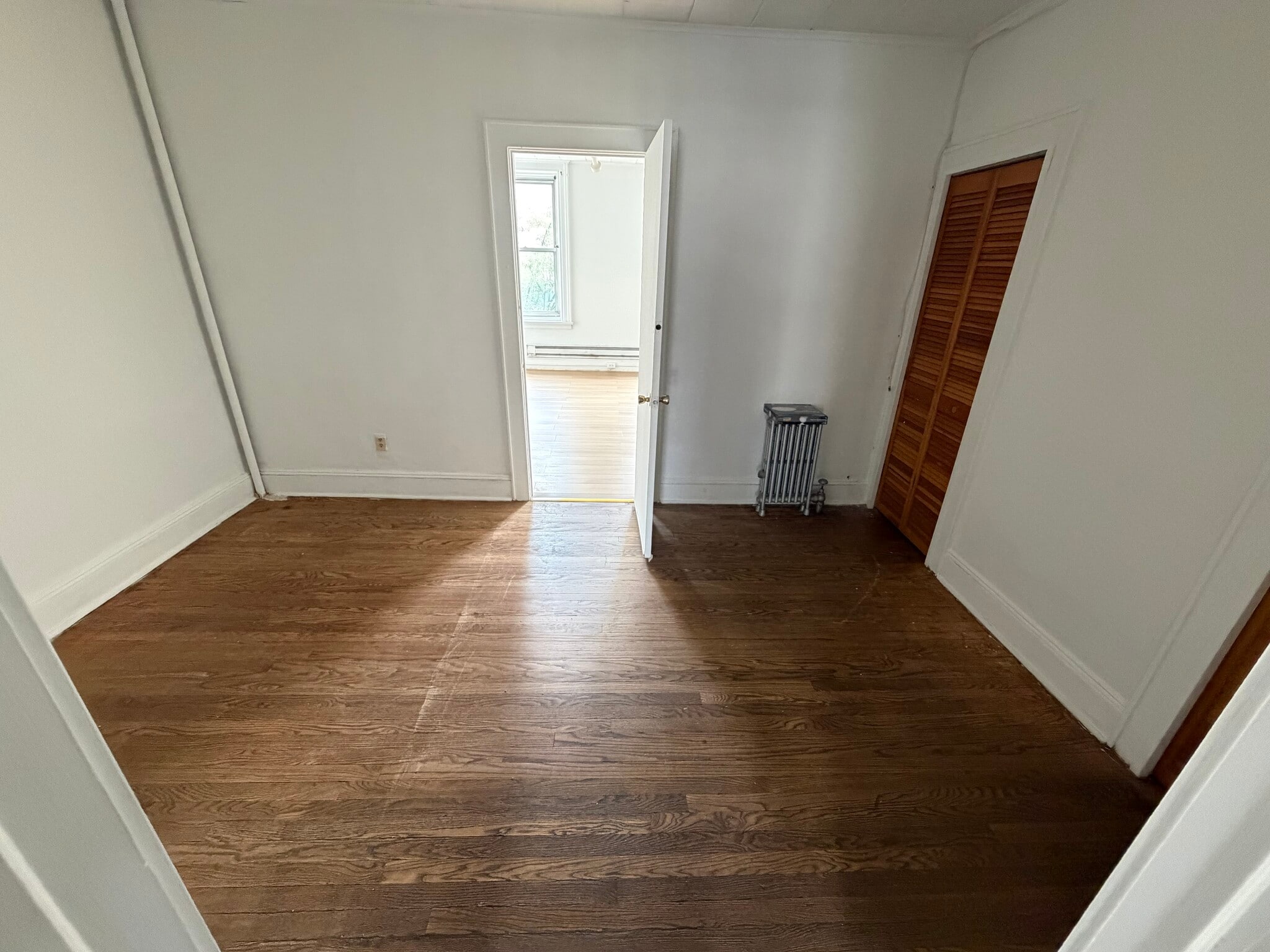 Room between kitchen and bedroom with large double closet - 147 Ferry St