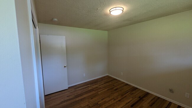 Building Photo - Spacious Three Bedroom with Large Backyard...