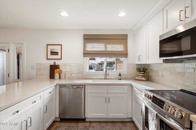 Building Photo - 8447 E Montebello Ave