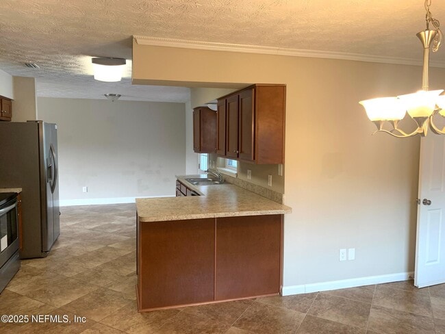 Building Photo - 7751 Lisa Dr E