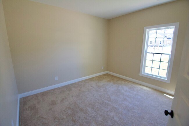 Building Photo - "Brand New Construction."  Quiet location, charming, cozy 3 bedroom duplex