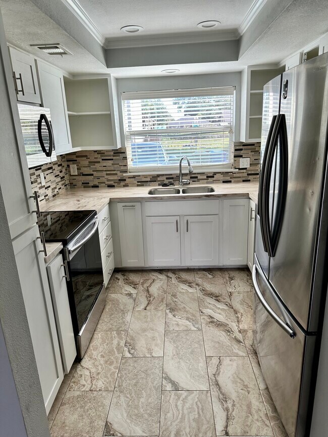 Kitchen with Samsung Appliances - 2871 S Pines Dr