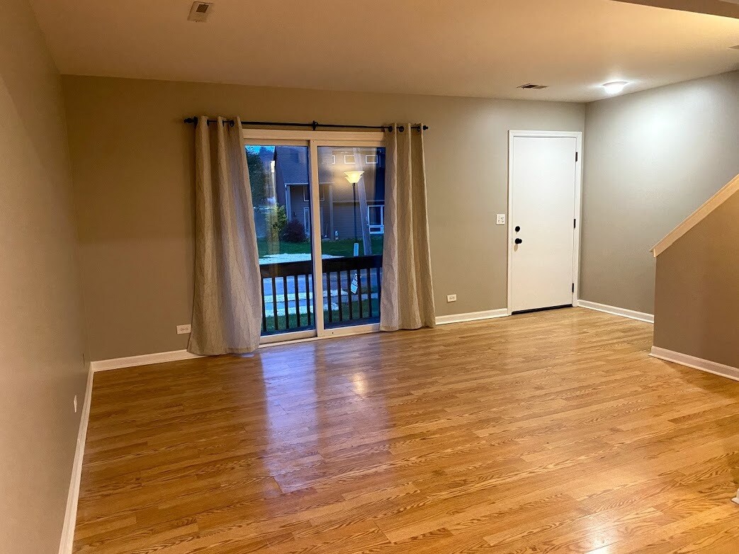 Living Room opens to balcony facing the Fox River - 518 N Harrison St