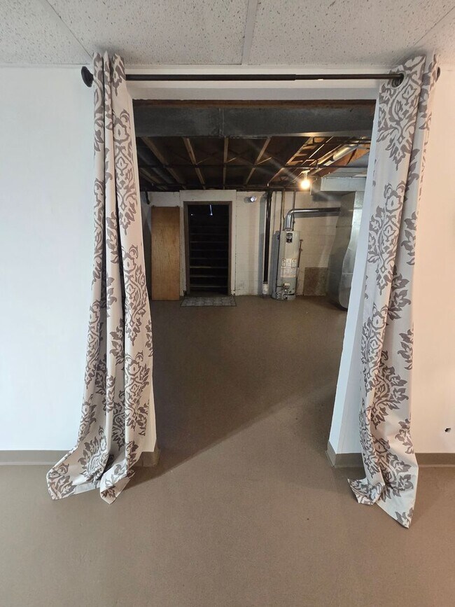 Building Photo - Updates abound at this SPACIOUS, half duplex with 3+ off-street parking spots, 3-bedrooms and 2 f...