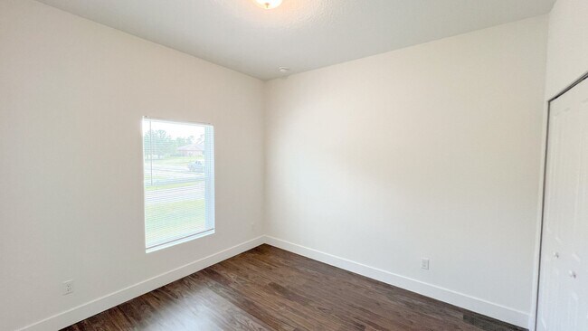 Building Photo - AVAILABLE NOW! 4 BD/2BA Home in Beautiful Palm Bay!! Wonderful home ready for move-in.