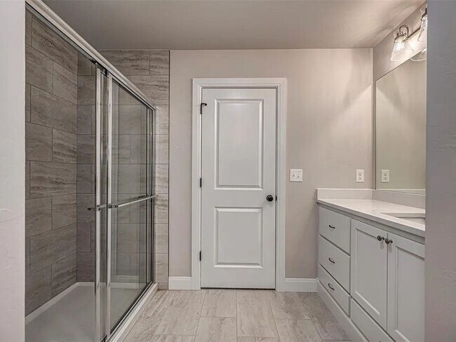 Building Photo - 4-Bed Home with Storm Shelter & 2-Car Garage in Mustang