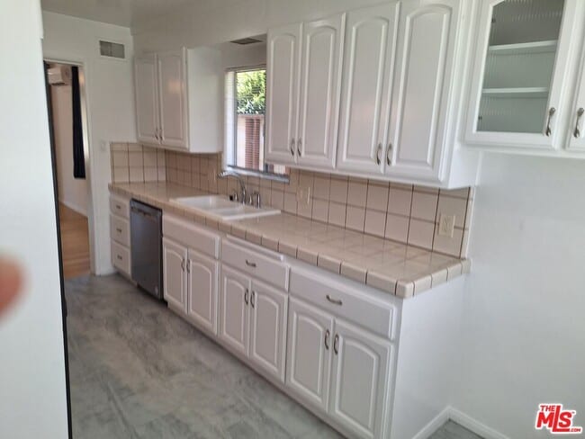 Building Photo - 6446 Riggs Pl