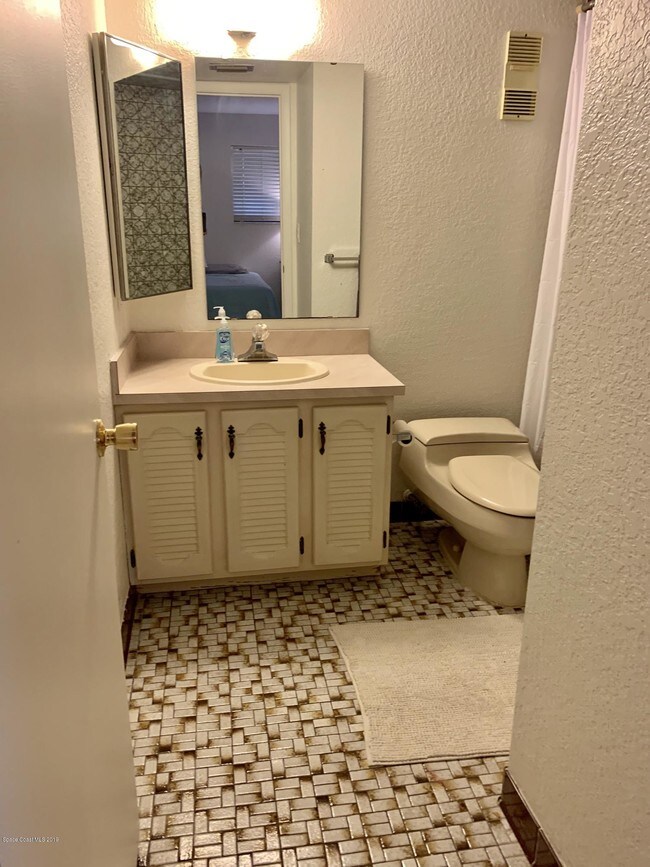 Building Photo - 205 S Banana River Blvd