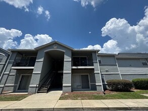 Building Photo - Modern 2-Bed/2-Bath Condo in Gated Communi...