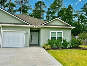 Building Photo - 3/2, landscaping included, fenced in yard!!