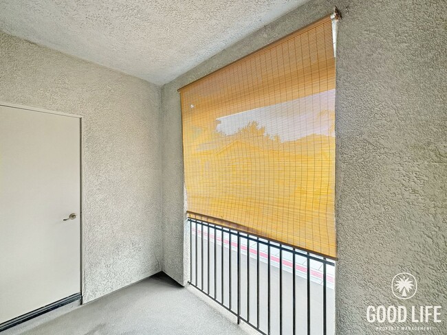 Building Photo - Welcoming 2B/2BA Condo with Balcony, In-Unit Laundry and Pool Access.