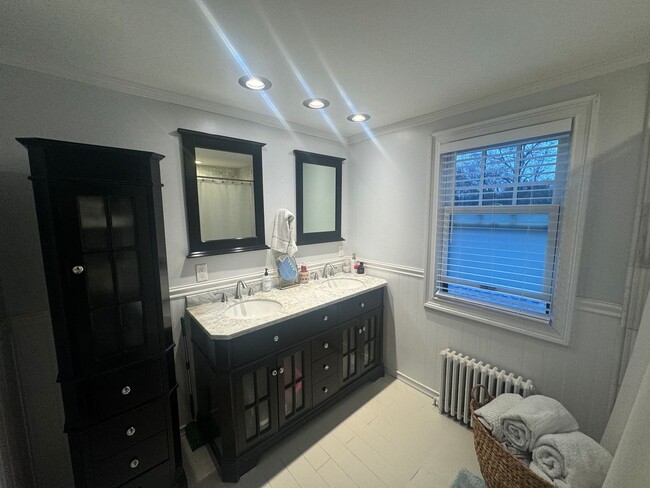 Building Photo - Charming Cape Cod Home with Updated Kitche...