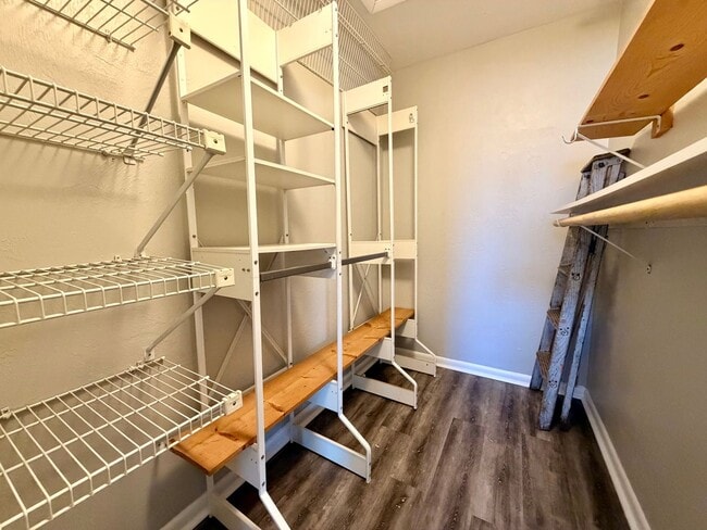 Building Photo - Light-Filled 2BR Condo in Gated Pelican Bay Near Golf, Beach & I-95