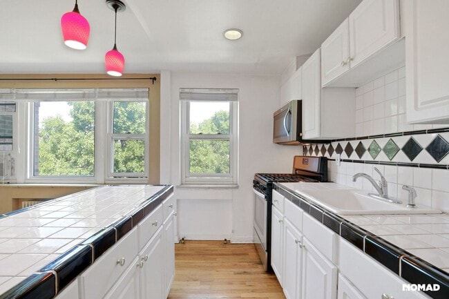 Building Photo - Charming 2BR Condo in Denver