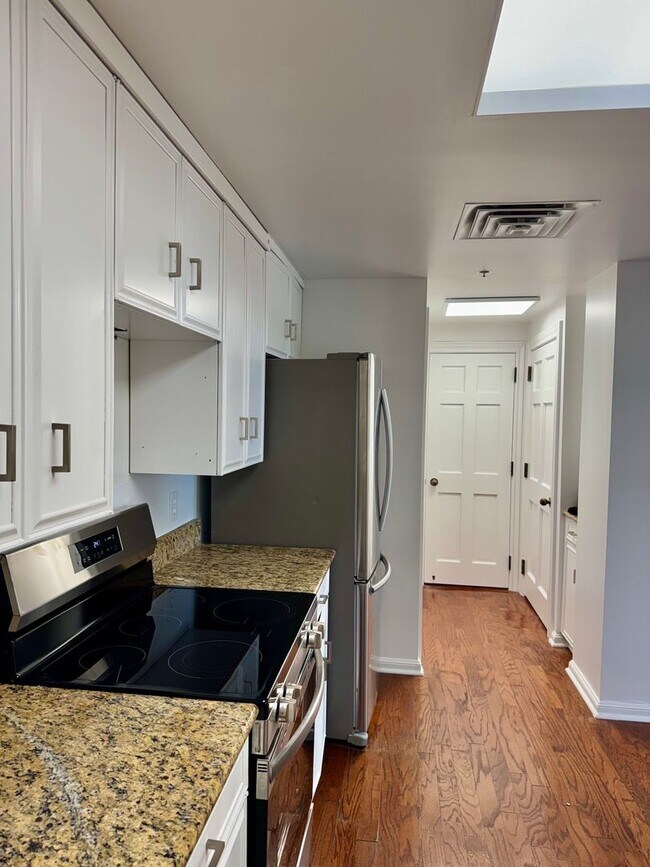 Building Photo - Experience Luxury and Prestige at Yorktown Condominiums