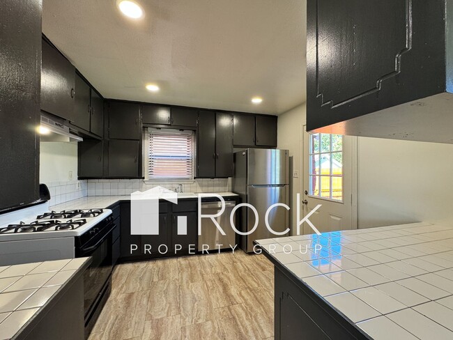 Building Photo - Charming Home with Real Wood Floors and Covered Parking ~ Offering 1 Month FREE Rent~