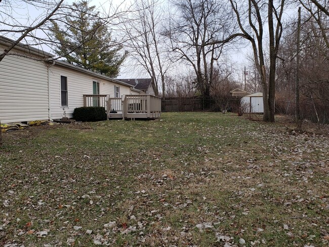 Building Photo - Spacious 4-bedroom, 2 bath, 2 car garage w...