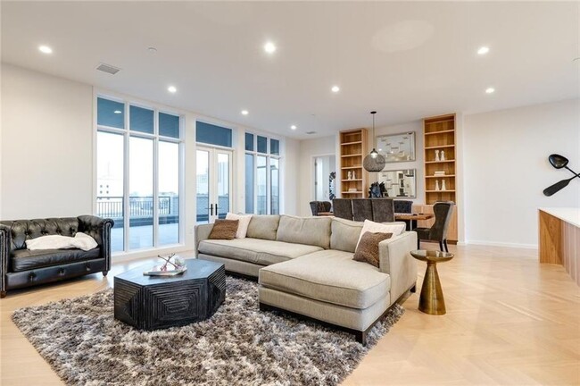 Building Photo - Fully Furnished-Posh Urban Penthouse in Mi...