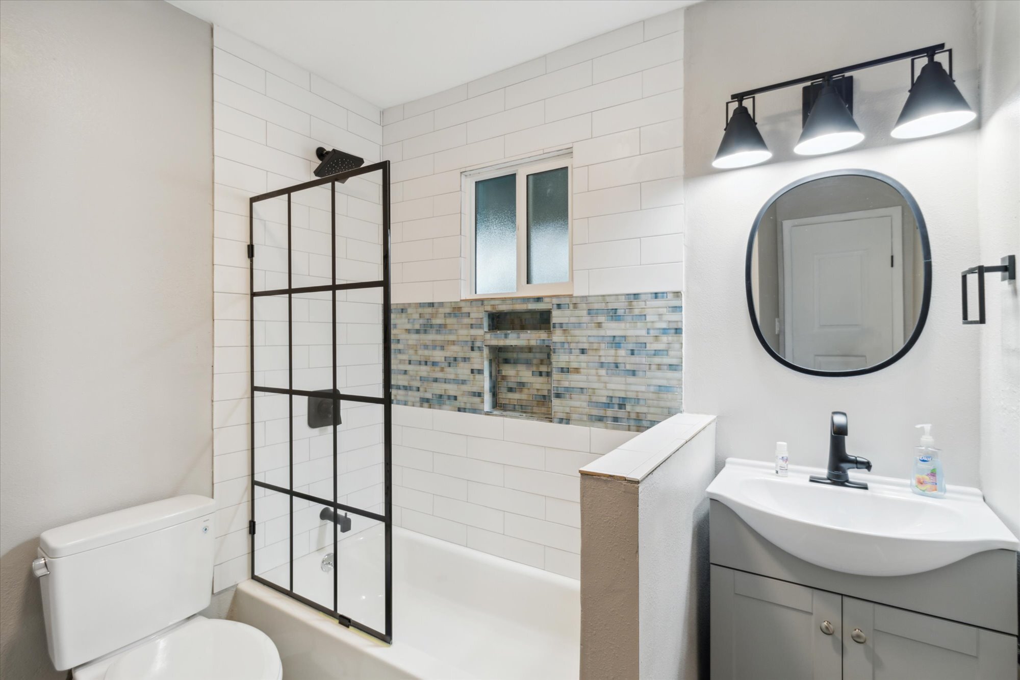 all modern bathroom fixtures! - 327 N 16th Ave