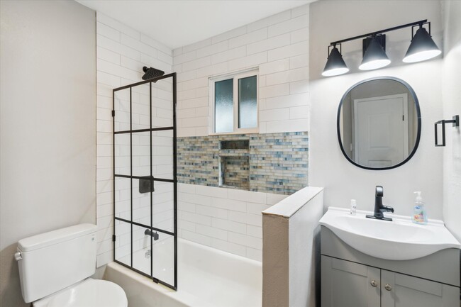 all modern bathroom fixtures! - 327 N 16th Ave